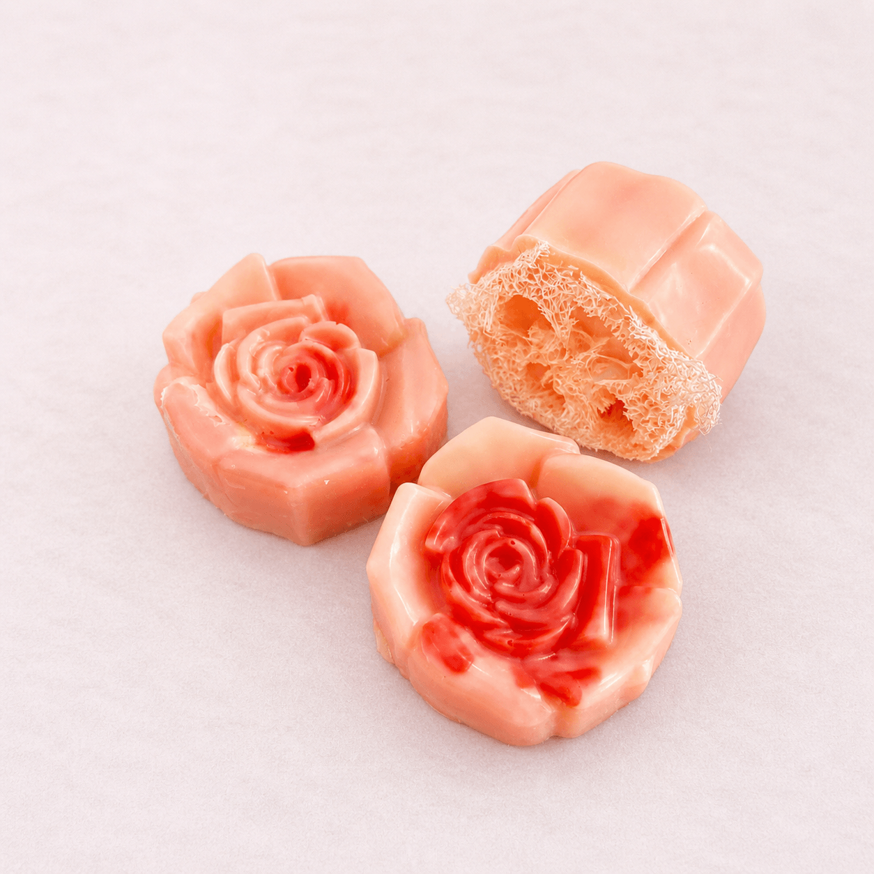 limited edition shea butter soap in elegant rose shapes, showcasing creamy moisturizing texture.